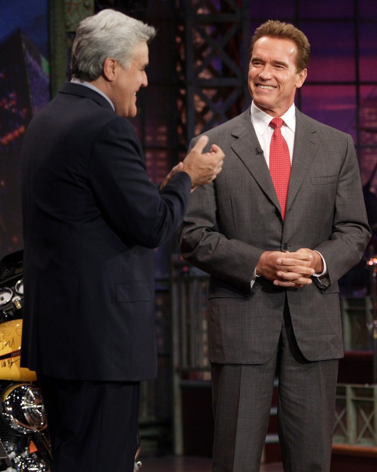 Late night host Jay Leno (r) welcomed Calif. Republican Governor Arnold Schwarzenegger to NBC's Tonight Show on Sept. 26, 2005.  The governor is scheduled to be back on Wednesday, Oct. 11 - four weeks before Election Day.