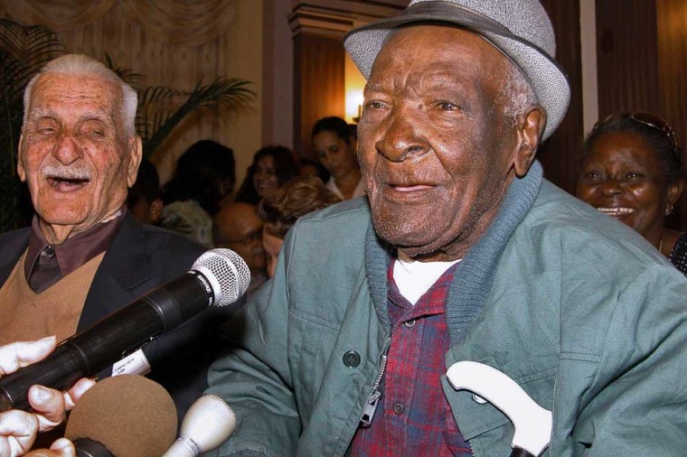 Cuban Benito Martinez Abogan, right, was said to be born on June 19, 1880 in Cavaillon, Haiti, but lived most of his life in Cuba. He died Wednesday at 126.  