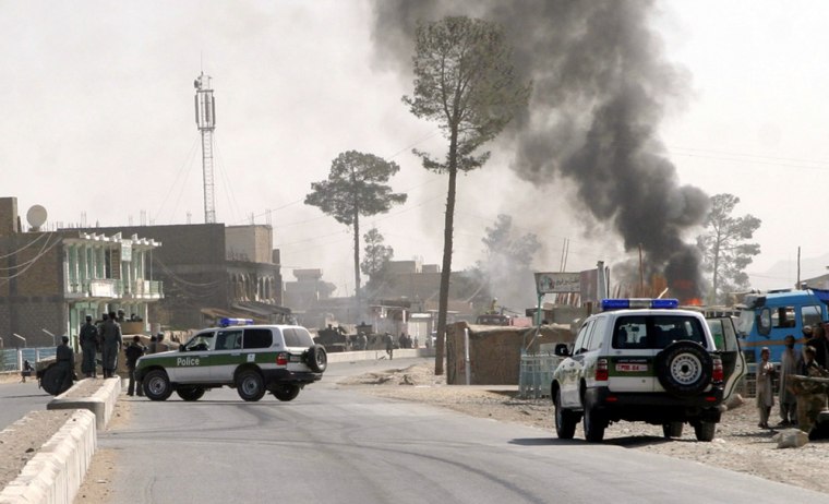 Smoke billows from a suicide blast site in the southern city of Kandahar