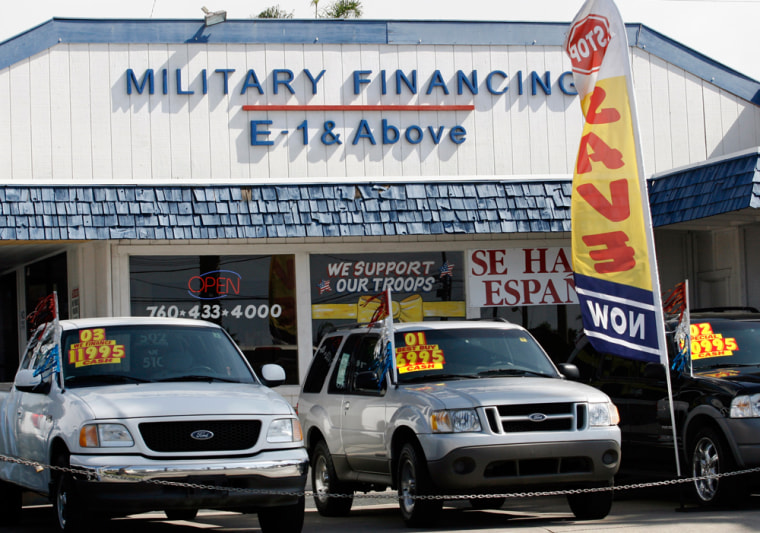 A used car dealership in Oceanside, Calif., offers financing to members of the armed forces. The lot is one of many businesses in downtown Oceanside offering credit to Marines from nearby Camp Pendleton.