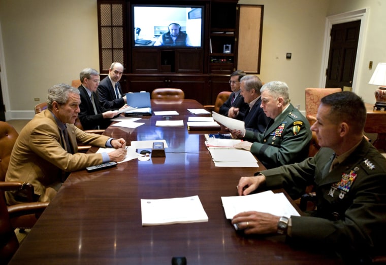 US President George Bush meets with military commanders at the White House in Washington