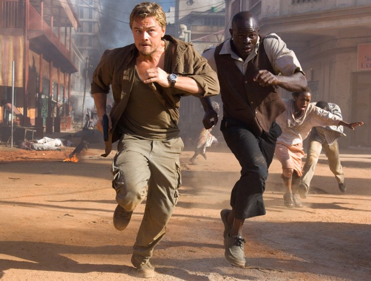 This undated photo, from  Warner Bros. Pictures, shows Leonardo DiCaprio, left, and Djimon Hounsou  in a scene from the film \"Blood Diamond,\" which debuts in December 2006. African moviemaking has caught a fire. International filmmakers have found stories they want to tell there. Hollywood has taken an interest in serious films, such as this one, set in Africa  (AP Photo/ Jaap Buitendijk ,Warner Bros. Pictures)