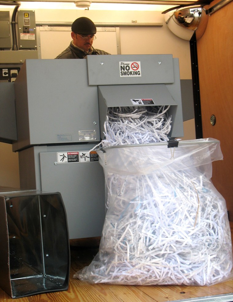 Documents belonging to residents of Westchester County in New York are devoured Wednesday by this giant shredder housed inside a truck.