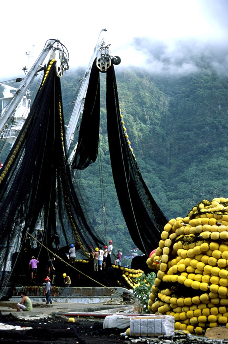 Experts attribute overfishing to the industrialization of boats like this one, which uses huge nets to catch tuna.