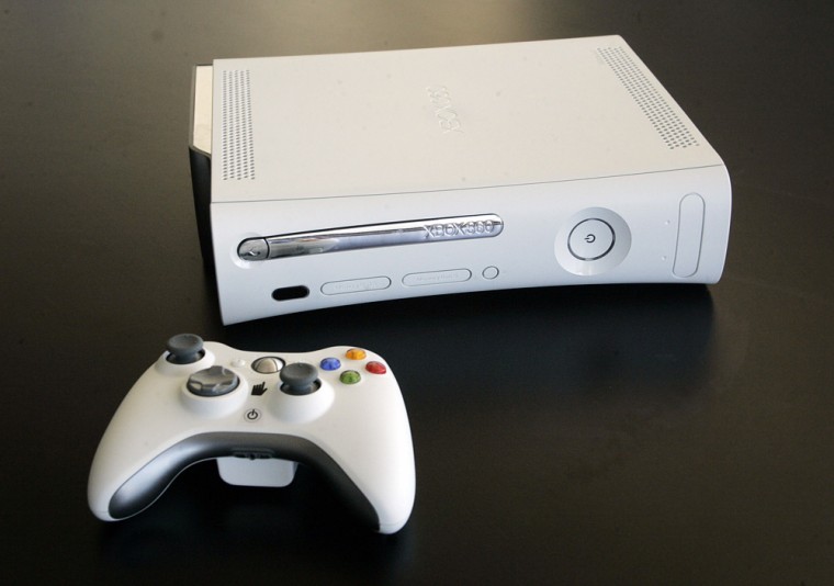 Microsoft Corp Xbox 360 video game console and controller are shown in Los Angeles
