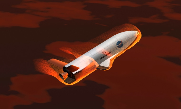 An artist's conception shows an X-37 demonstrator making a fiery re-entry at the end of an orbital mission. The X-37B, also known as the Orbital Test Vehicle, is to be developed by the U.S. Air Force with the Boeing Co. as the prime contractor.
