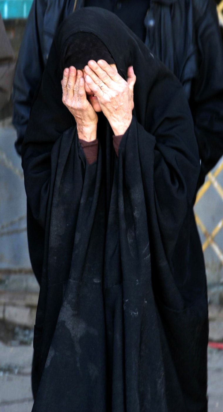 An Iraqi woman mourns the death of her r