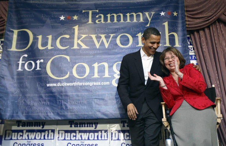 U.S. Senator Obama shares a laugh with Iraq War veteran and Democratic Congressional candidate Duckworth in Elmhurst