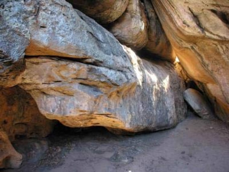The newfound python carved from stone in a cave in the Tsodilo Hills of Botswana contained more than 400 indentations that could have been made only by humans.