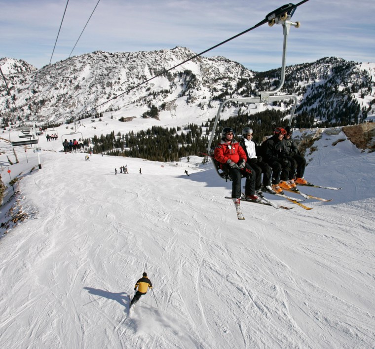 Skiers take the lift up to the slopes at Alta Ski Resort in Alta, Utah. Alta earned an "A" from the SKi Area Citizens' Coalition for its environmentally friendly practices. 