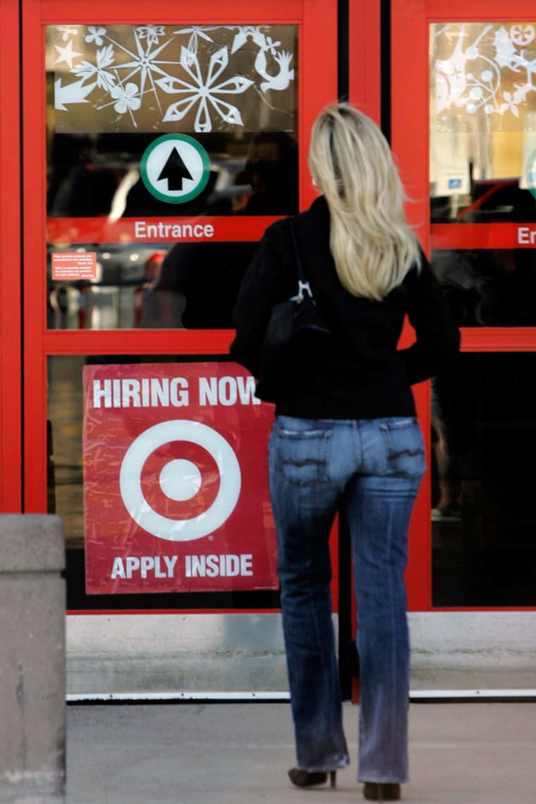 A sign saying Hiring Now greets a shopper as she enters a retail store in Dallas, Tuesday, Nov. 28, 2006. Retail stores have realized that a Help Wanted sign in the window isn't enough to attract holiday help in a time of low unemployment.