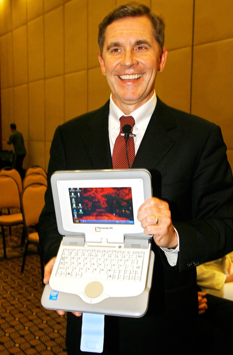 Intel's John Davies poses for a photo with the "Classmate PC" in Sao Paulo, Brazil. Intel is offering up the pint-sized, $400 laptop for Brazilian school children that will be evaluated by the government next year.