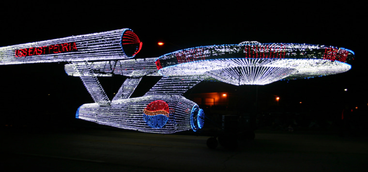 ** FOR IMMEDIATE RELEASE **This November 2006 photo provided by the City of East Peoria, shows the Enterprise float in the Festival of Lights in East Peoria, Ill. This float is very popular with Star Trek fans and was redone with LED lights this year. The float is 57 feet long, 22 feet wide and 14 feet tall, and illuminated with 52,000 lights.  (AP Photo/City of East Peoria, Jill Peterson)