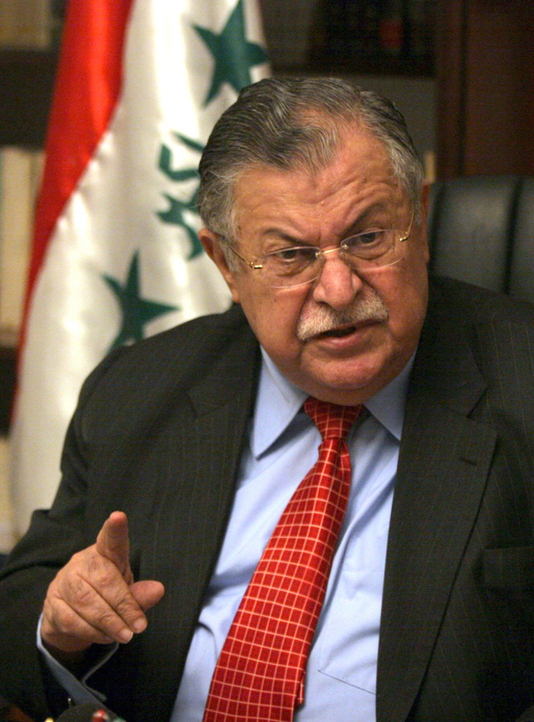Iraqi President Jalal Talabani gestures