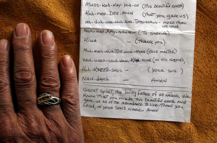 Ken Custalow, a member of Virginia's Mattaponi Indian Tribe, offered a prayer in the Virginia Algonquian language at a ceremony this summer in England. His list of translations is seen here in West Point, Virginia, on Friday.