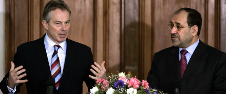 British Prime Minister Tony Blair (L) ge
