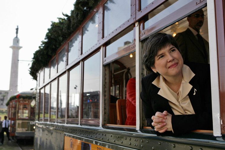 City Council District member Shelly Midura peers out of a streetcar that made a return to a portion of St. Charles Avenue in New Orleans on Tuesday.