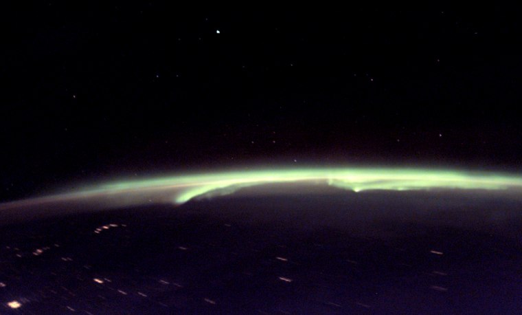 This photo taken by a STS-116 crew member onboard Space Shuttle Discovery and released by NASA shows the aurora borealis, also known as