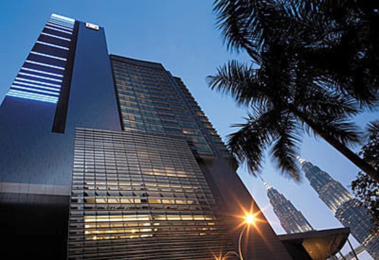 The Traders Hotel is located at the Kuala Lumpur city center, and guest rooms feature wireless broadband internet and LCD TVs. A room on the Traders Club floor comes with access to the Club lounge and private computer rooms.