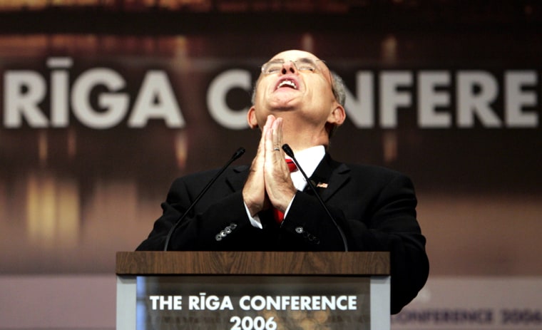 Former New York Mayor Rudolph Giuliani gestures while speaking during the Riga Conference, on the sidelines of a NATO summit, at Blackheads House in Riga, Tuesday Nov. 28, 2006. According to a poll released on Monday, that scores the popularity of national leaders, Americans have the warmest feelings about former New York City ,Mayor Rudy Giuliani, Republican Senator John McCain and Democratic Senator Barack Obama. (AP Photo/Virginia Mayo)