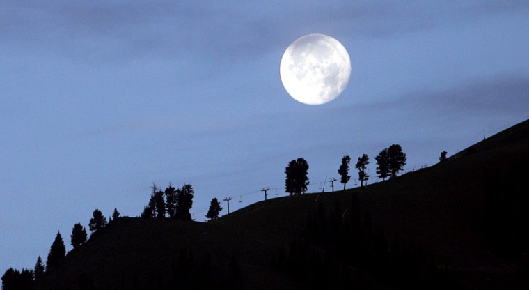 The moon rises over the hills above Sun Valley, Idaho. Native American tribes kept track of the seasons by giving distinctive names to each recurring full moon.