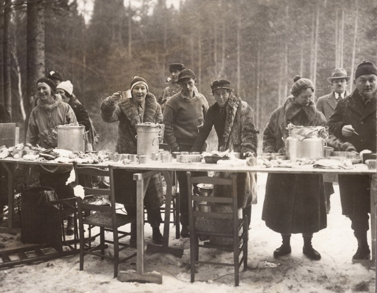 This 1932 photo provided by the Lake Placid Winter Olympic Museum shows a volunteer feed station for the Cross Country Ski events during the 1932 Winter Olympics in Lake Placid, N.Y. 