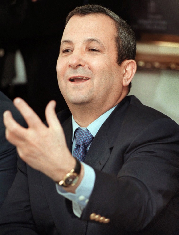 Ehud Barak, then Israeli Prime Minister, speaks at a meeting of the One Israel political group at the Knesset, Israel's parliament in this November 2000 file photo. Barak announced his bid for a political comeback on Sunday. 