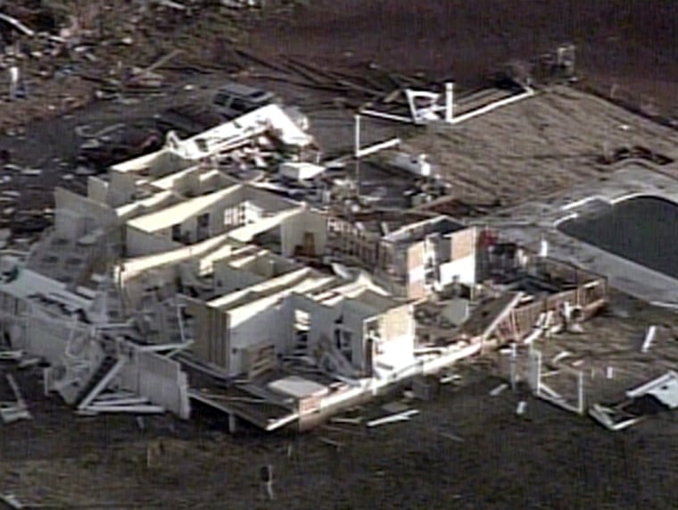This home outside Atlanta, Ga., was destroyed Sunday by what experts think was a tornado.