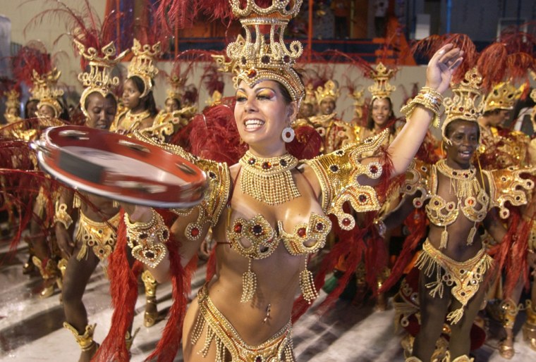 Dancers of "Renacer de Jacarepagua" samba school participate during the Carnival at the Sambodromo, in Rio de Janeiro, Brazil, in this file photo. Carnival is just one of several winter festivals travelers can take in.