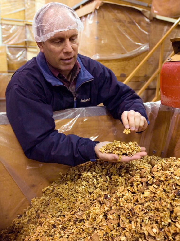 Vito Chiesa checks his walnut harvest at Grower Direct Nut Co. For generations Chiesa's family has grown peaches for canning, but the central California farmer plans to bulldoze his orchards if he can't get enough workers to hand-pick the fruit.