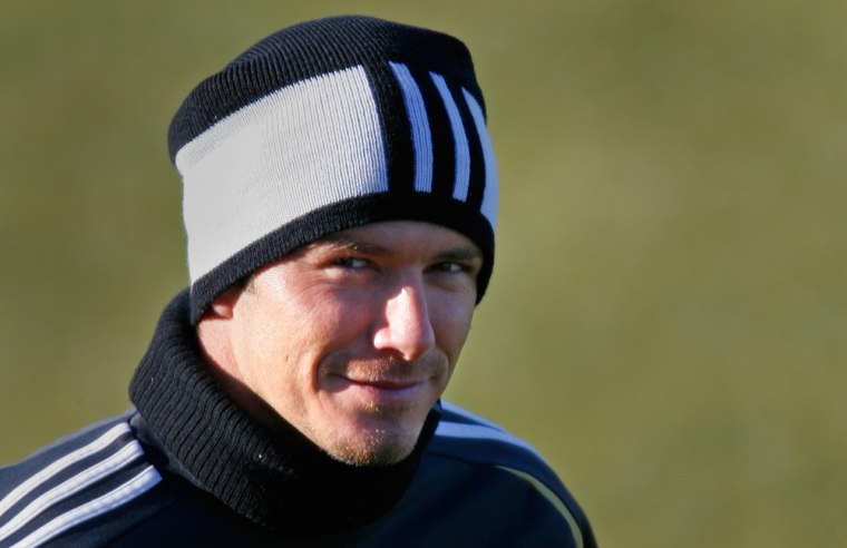 Real Madrid's David Beckham smiles during a training session at Real Madrid's training base in Valdebebas
