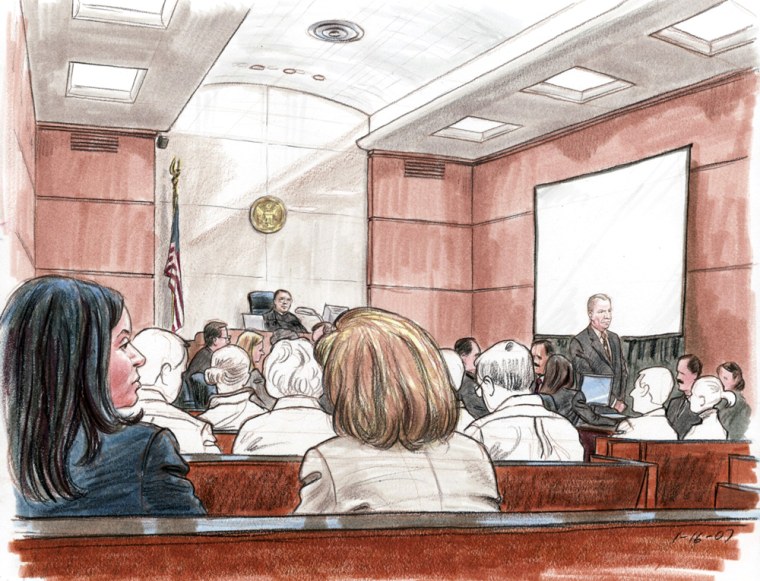 Harriet Grant, left foreground, watches as her husband, I. Lewis "Scooter" Libby, right background, faces the potential jury pool (who are shown only in outline at judge's instruction) at the start of juror selection in Scooter Libby's perjury trial.