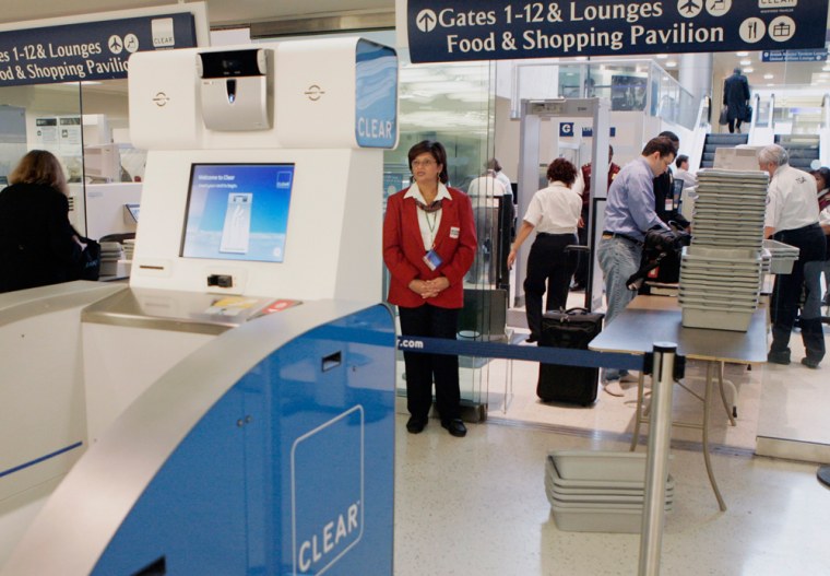 A Clear Registered Traveler scanner kiosk is on display at a TSA checkpoint during a demonstration in the British Airways terminal of New York's Kennedy Airport. 