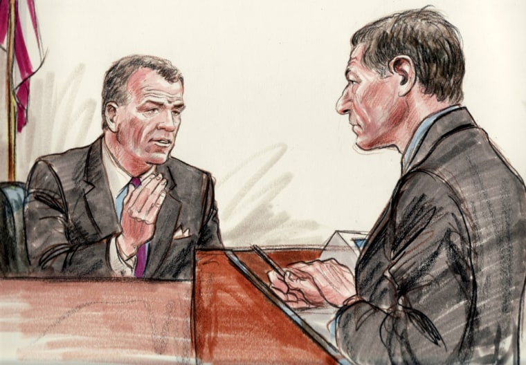 Former CIA official Robert Grenier being questioned by Assistant U.S. Attorney Peter Ziedenberg.