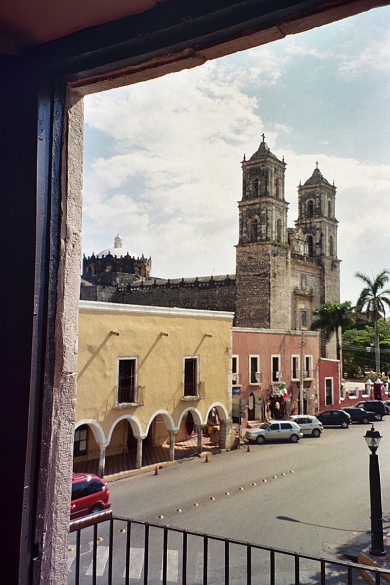 The main square or zocalo and the Iglesia de San Servacio in the pastel-colored colonial town of Valladolid, founded in 1543, on the way from Cancun to the ruins of Chichen Itza. Mexico, June 2006. (AP Photo/Giovanna Dell'Orto)
