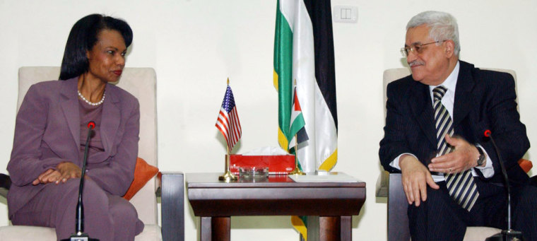 Palestinian President Mahmoud Abbas talks to Secretary of State Condoleezza Rice during their meeting in the West Bank city of Ramallah on Sunday.