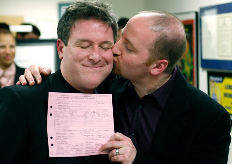 Gross kisses his partner Goldstein after the completion of their civil union ceremony in Teaneck