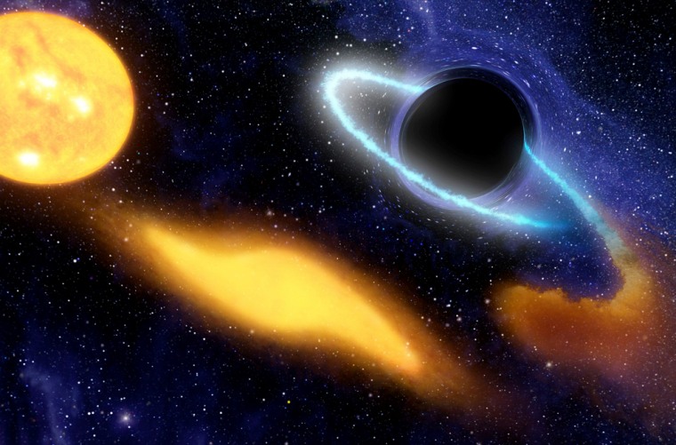 An artist's concept shows a supermassive black hole at the center of a remote galaxy digesting the remnants of a star