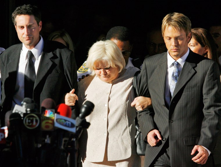 Stern, Anna Nicole Smith's mother Virgie Arthur, and Birkhead walk arm-in-arm out the Broward County Circuit Court in Ft. Lauderdale