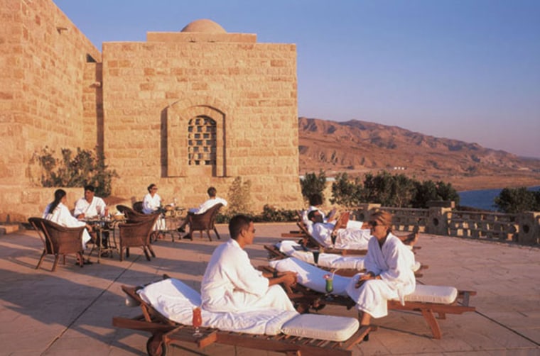 Robed guests socialize on Zara Spa’s terrace.