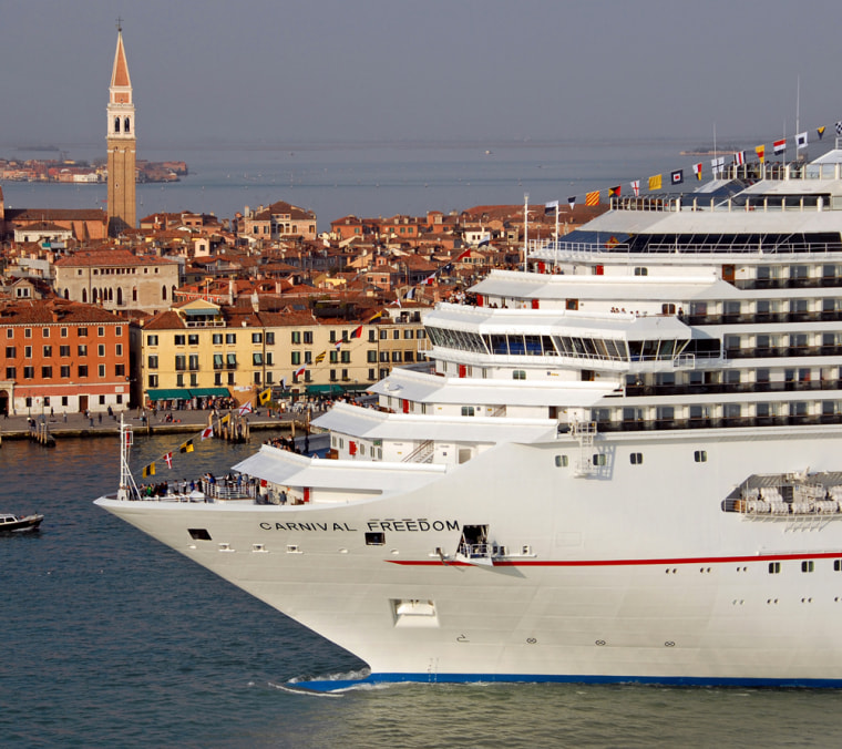 In this photo, released by Carnival Cruise Lines, the new Carnival Freedom arrives in Venice, Italy, following a short voyage from its Italian shipyard Saturday, March 3, 2007. The 22nd vessel for Miami-based Carnival Cruise Lines is 952 feet long, features 1,487 staterooms, a 13,300-square-foot health club, a 270-square-foot outdoor video screen and wireless internet throughout the entire vessel. On March 5, Carnival Freedom is to begin a series of Mediterranean and Greek Isle cruises, before being repositioned to Miami for Caribbean voyages starting Nov. 17. (AP Photo/Carnival Cruise Lines, Andy Newman) **NO SALES**