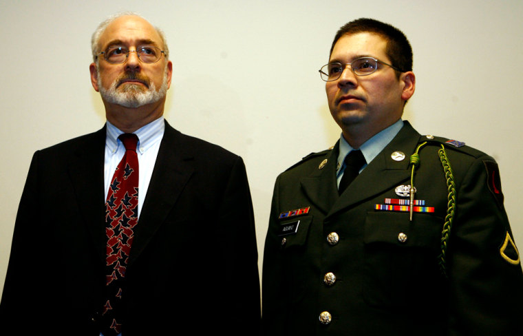 US Army medic and self-described conscientious objector Aguayo and his lawyer Court pause before a statement at the Leighton Barracks in Wuerzburg