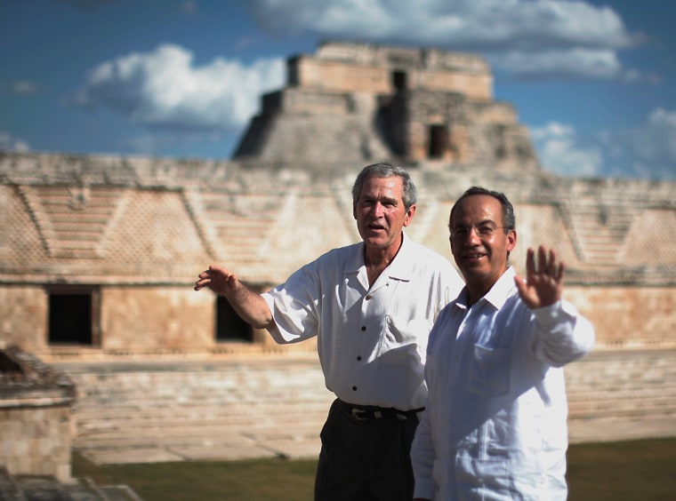 U.S. President George W. Bush and Mexico's President Calderon tour the Mayan ruins in Uxmal