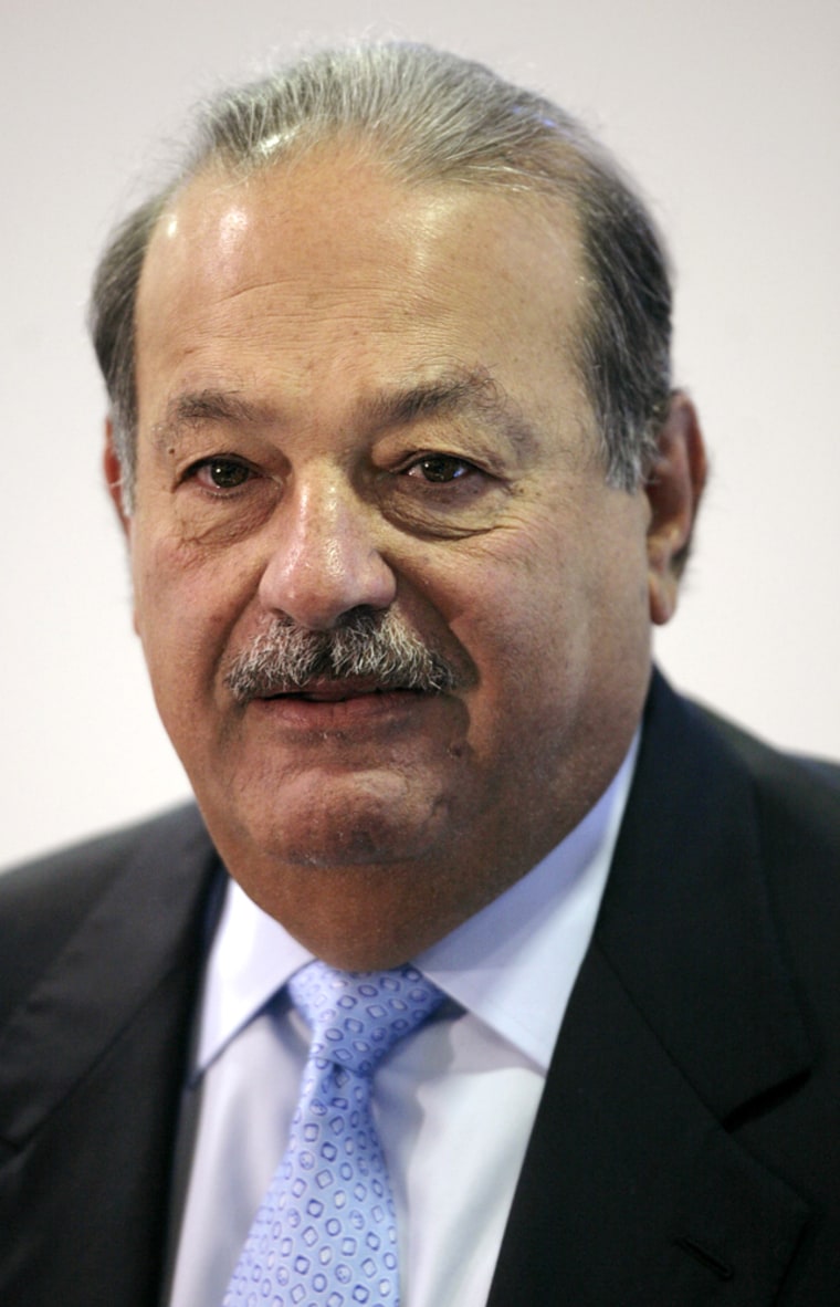 Mexican tycoon Carlos Slim Helu speaks at a news conference in Mexico City