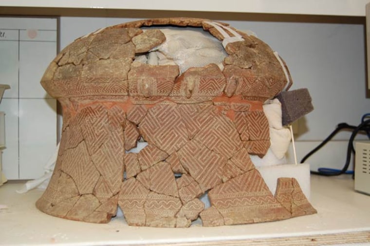 A Lapita pot currently being reconstructed at the Australian Museum.