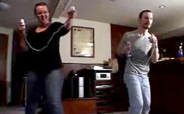 Partygoers Sara Loken and Kevin Swantek enjoyed their virtual boxing match, courtesy of Nintendo's "Wii Sports" game. 