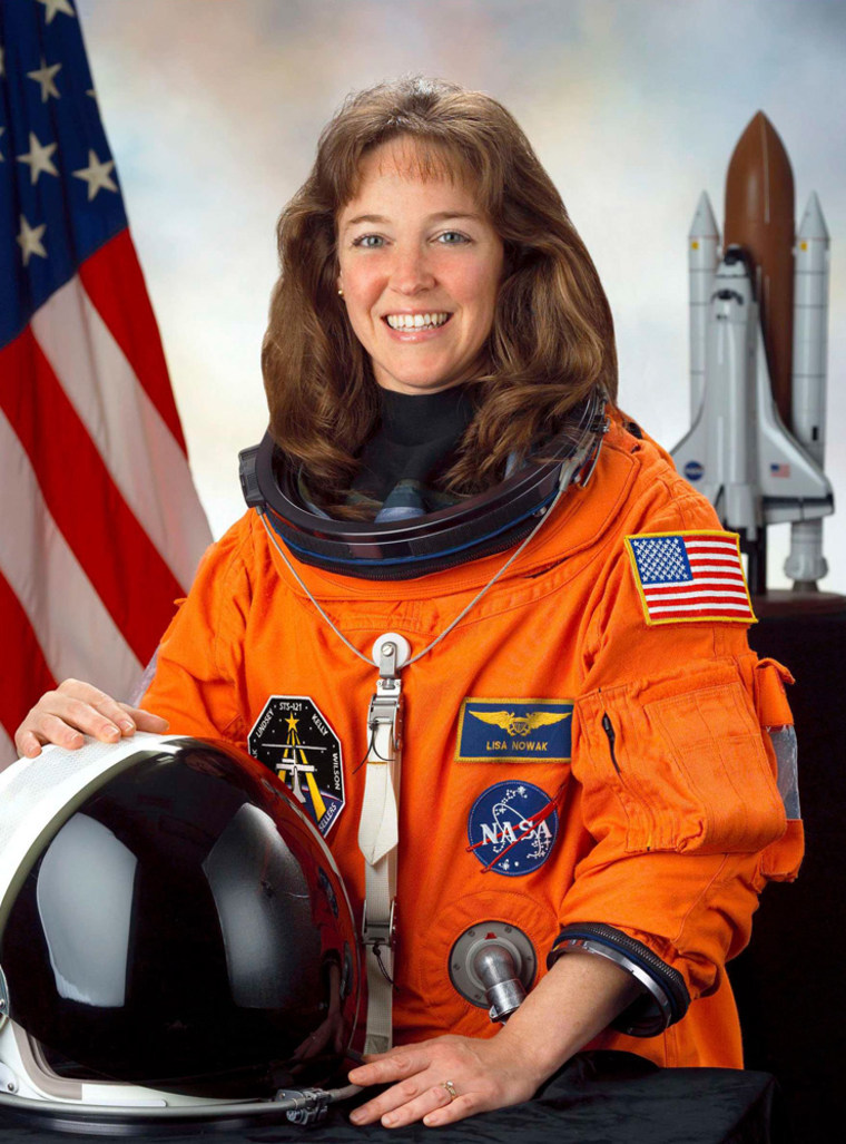 This combination photo shows NASA Astronaut Lisa Nowak and William Oefelein in there official NASA portraits