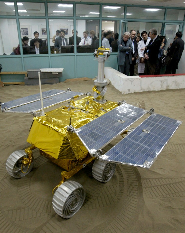 A China-made lunar rover makes its debut during an exchange on space technology between China and the United Kingdom in Shanghai