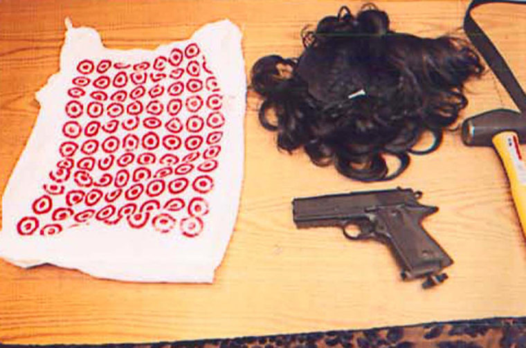 This photo released by the Orlando State Attorney's office on Tuesday, April 10, 2007, shows items including a wig, a bag, a hammer and a stun gun that were recovered from the car driven by NASA astronaut Lisa Nowak after she was arrested for trying to kidnap a romantic rival. Nowak was arrested in February 2007 after police say she drove from Houston to Florida to confront Air Force Capt. Colleen Shipman. Authorities have said Nowak had an affair with Shipman's boyfriend, Bill Oefelein. (AP Photo/Orlando State Attorney's office)