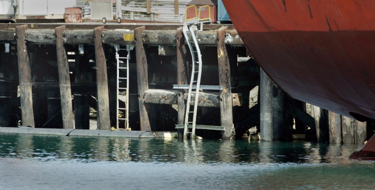 A pier at a Valero oil terminal at the Port of Los Angeles shows damage to ladders and so-called "sacrificial" pilings designed to be replaced.